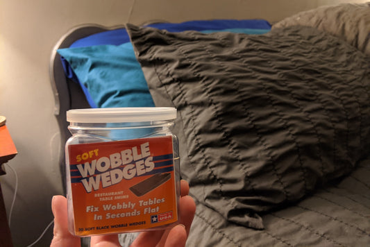 Use Wobble Wedge plastic shims to fix a creaking bed frame.