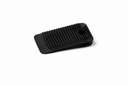 Detailed view of a black mini Wobble Wedge on a white background